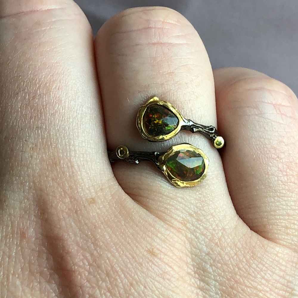 Sterling silver & genuine opal bypass ring plated with black rhodium & 14kt gold
